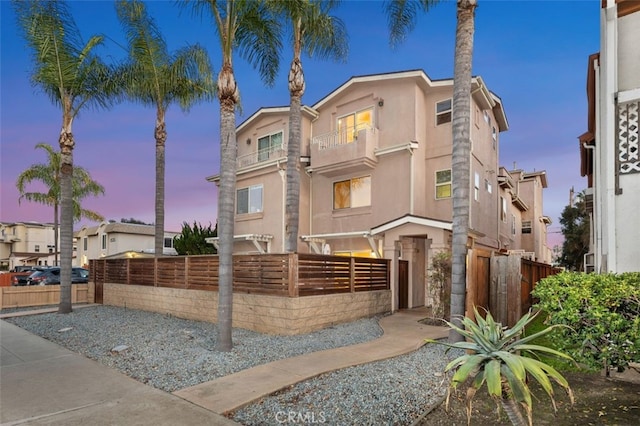 1517 Felspar St, San Diego, CA 92109 - view of front of house with stucco siding and a balcony