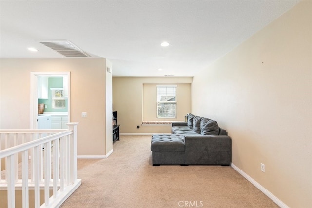 33734 Wild Horse Way, Yucaipa, CA 92399 - living area featuring light colored carpet, recessed lighting, and baseboards