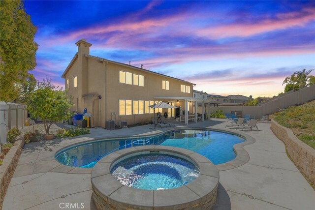 33734 Wild Horse Way, Yucaipa, CA 92399 - view of swimming pool with a patio area, a fenced backyard, and a pool with connected hot tub