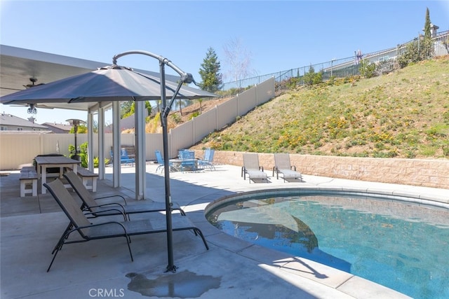 33734 Wild Horse Way, Yucaipa, CA 92399 - view of swimming pool featuring a patio area, a fenced backyard, a gazebo, and a fire pit