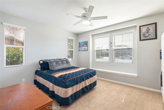 33734 Wild Horse Way, Yucaipa, CA 92399 - bedroom featuring multiple windows, light carpet, and baseboards