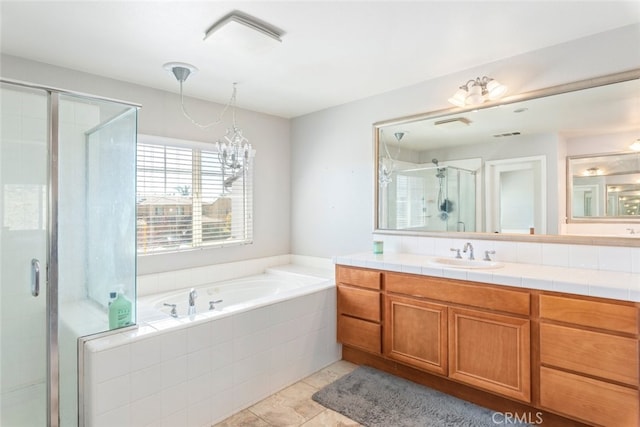33734 Wild Horse Way, Yucaipa, CA 92399 - full bathroom with a shower stall, vanity, a bath, tile patterned flooring, and a chandelier