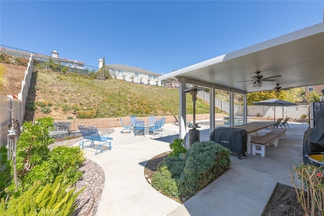 33734 Wild Horse Way, Yucaipa, CA 92399 - fenced backyard with outdoor dining space, ceiling fan, a patio, and a grill