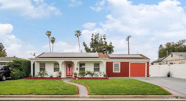 915 S Danehurst Ave, Glendora, CA 91740 - ranch-style home featuring concrete driveway, stucco siding, covered porch, an attached garage, and roof mounted solar panels
