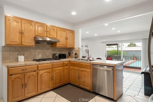 915 S Danehurst Ave, Glendora, CA 91740 - kitchen featuring stainless steel appliances, a sink, under cabinet range hood, tile counters, and a peninsula
