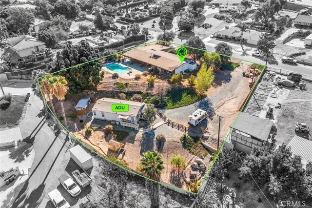 7160 Bel Air St, Corona, CA 92881 - aerial view of property and surrounding area with property boundaries highlighted and a pool area