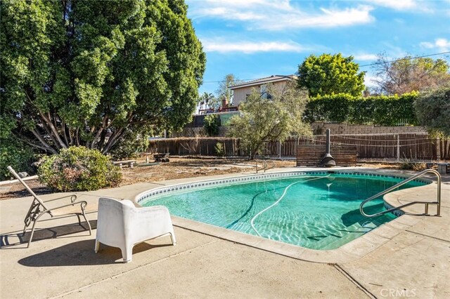 7160 Bel Air St, Corona, CA 92881 - view of swimming pool with a fenced backyard and a patio