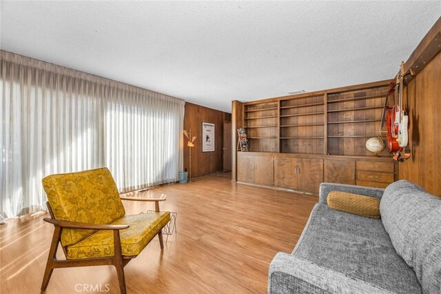 7160 Bel Air St, Corona, CA 92881 - sitting room featuring wood finished floors and wood walls