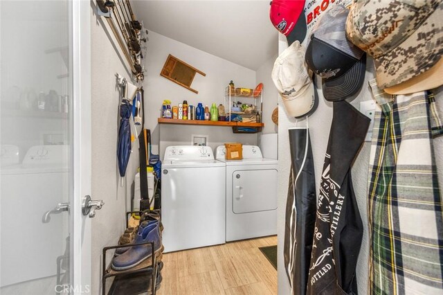 7160 Bel Air St, Corona, CA 92881 - laundry area featuring washer and clothes dryer and light wood finished floors