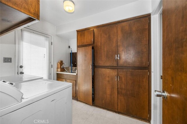 7160 Bel Air St, Corona, CA 92881 - laundry room with cabinet space and washing machine and clothes dryer