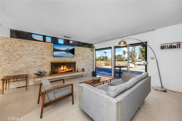 7160 Bel Air St, Corona, CA 92881 - living room featuring a fireplace and a textured ceiling