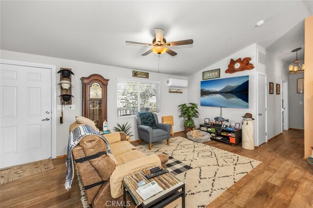 7160 Bel Air St, Corona, CA 92881 - living room featuring ceiling fan, an AC wall unit, wood finished floors, and vaulted ceiling