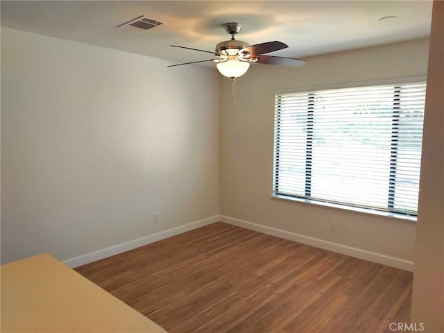 27535 Lakeview Dr Unit 14, Helendale, CA 92342 - spare room with ceiling fan, baseboards, and wood finished floors