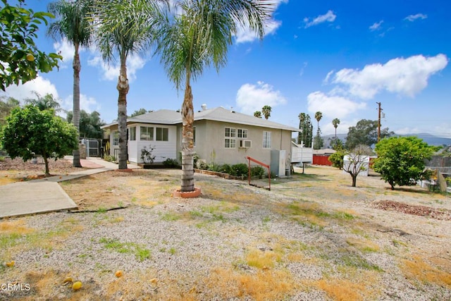 view of front of home featuring stucco siding