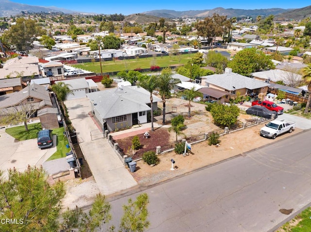 bird's eye view featuring a mountain view and a residential view