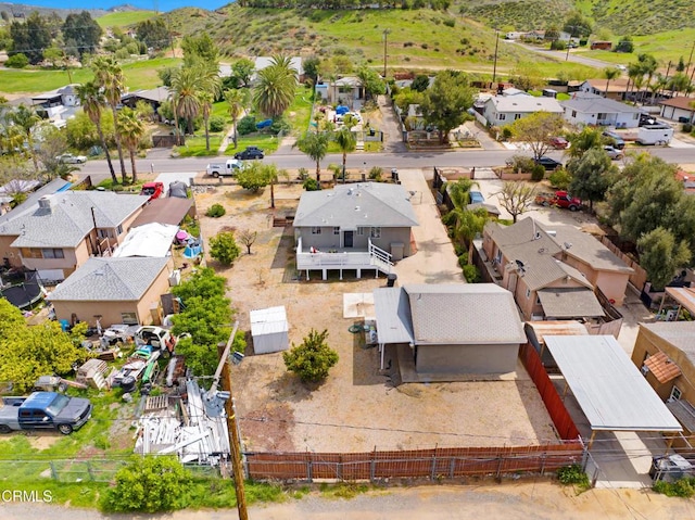 drone / aerial view with a residential view and a mountain view