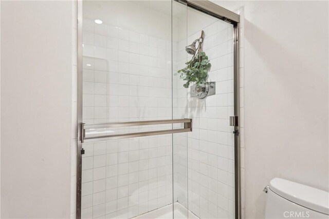 800 W 1st St Unit 1803, Los Angeles, CA 90012 - full bath featuring toilet and a stall shower