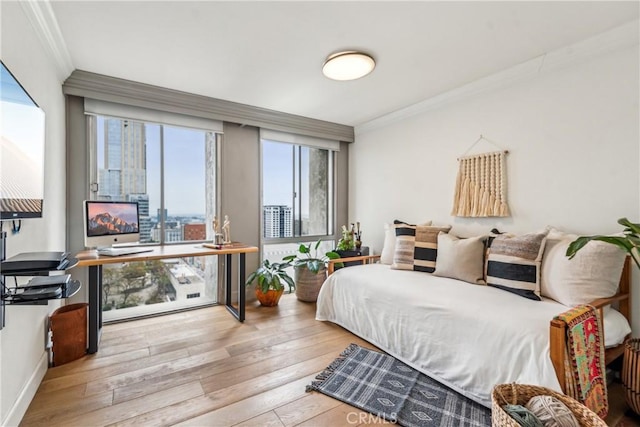 800 W 1st St Unit 1803, Los Angeles, CA 90012 - bedroom featuring crown molding, hardwood / wood-style flooring, and baseboards