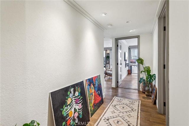 800 W 1st St Unit 1803, Los Angeles, CA 90012 - hall featuring crown molding, wood finished floors, and recessed lighting