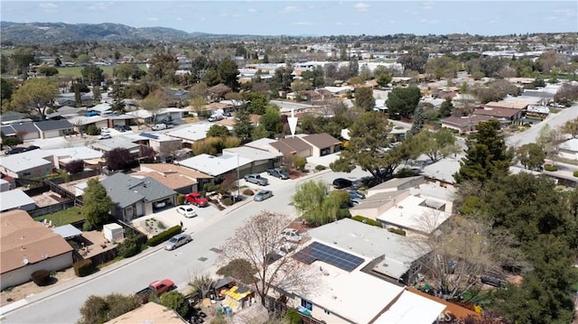aerial view featuring a residential view and a mountain view