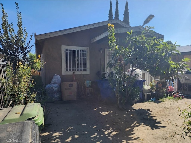 242 E 92nd St, Los Angeles, CA 90003 - view of side of property with stucco siding