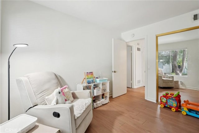 22230 S Vermont Ave Unit 102B, Torrance, CA 90502 - rec room featuring wood finished floors