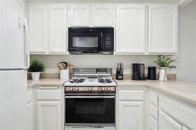 22230 S Vermont Ave Unit 102B, Torrance, CA 90502 - kitchen with white appliances, white cabinets, and light countertops