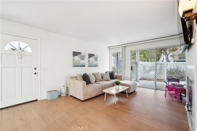 22230 S Vermont Ave Unit 102B, Torrance, CA 90502 - living room featuring light wood-style flooring