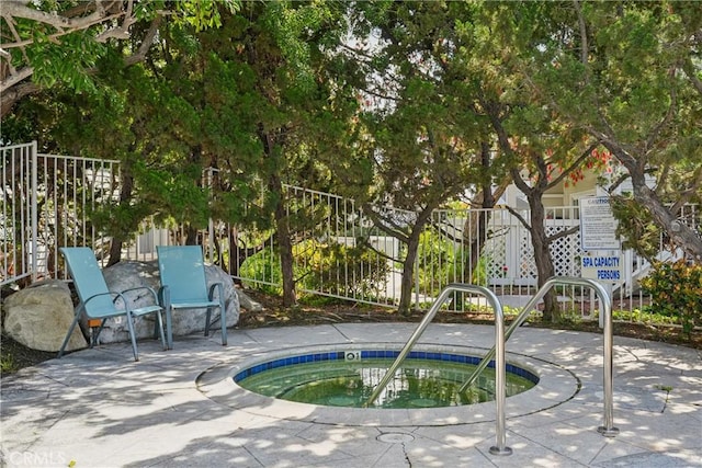22230 S Vermont Ave Unit 102B, Torrance, CA 90502 - view of swimming pool featuring a community hot tub