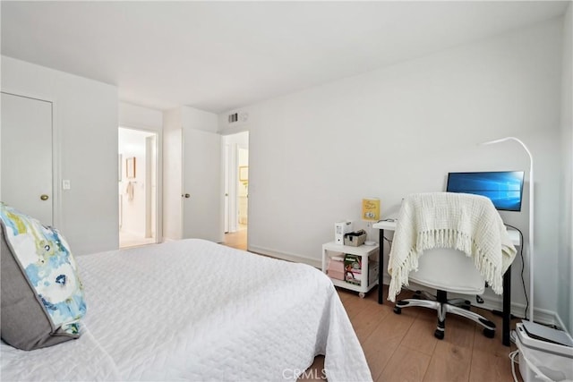 22230 S Vermont Ave Unit 102B, Torrance, CA 90502 - bedroom with wood finished floors
