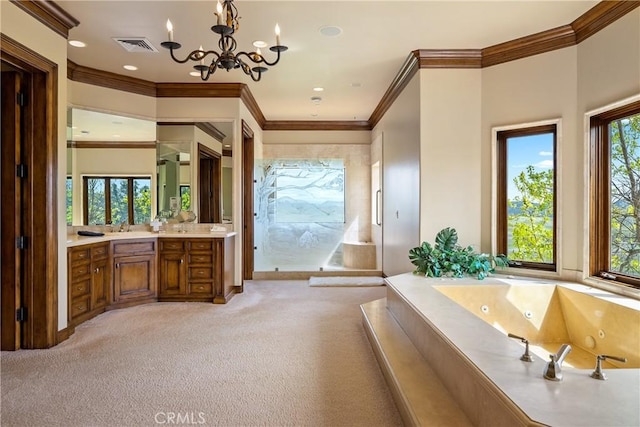 bathroom with an inviting chandelier, plenty of natural light, a whirlpool tub, and vanity