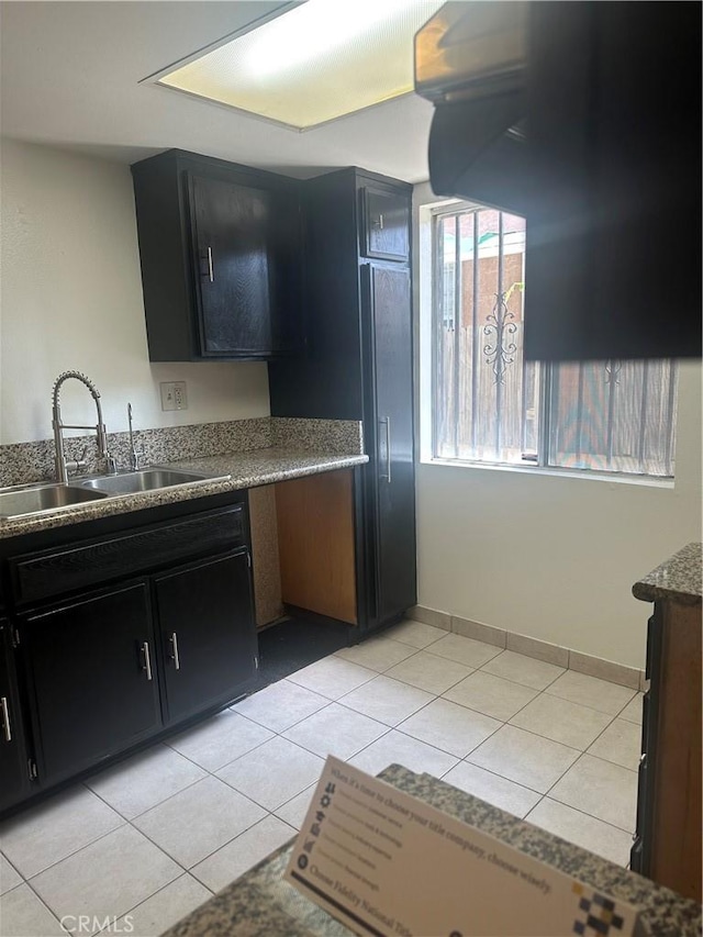 1524 Acacia St Unit 3, Alhambra, CA 91801 - kitchen with a sink, dark cabinetry, and light tile patterned floors