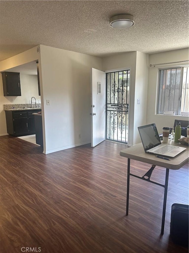 1524 Acacia St Unit 3, Alhambra, CA 91801 - office featuring dark wood-style floors, a sink, a textured ceiling, and baseboards