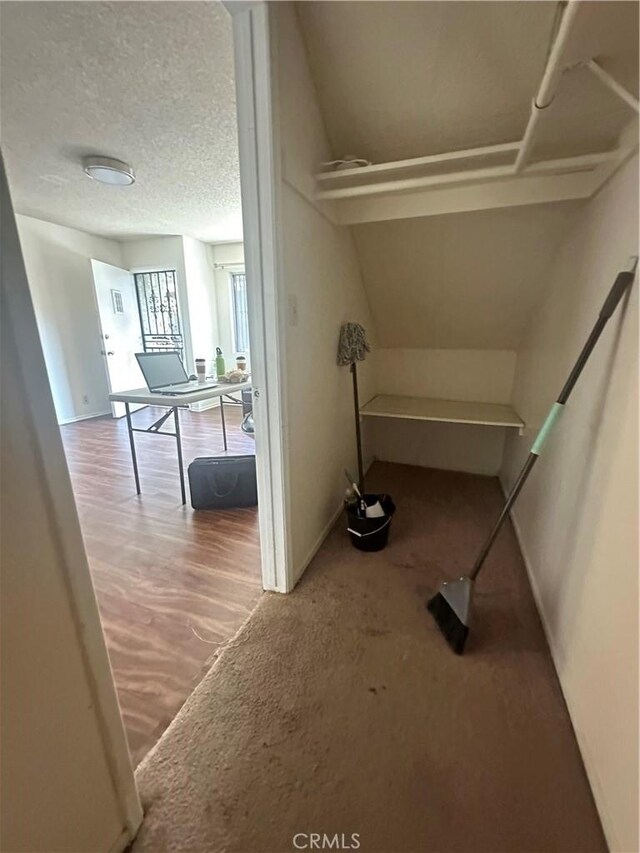 1524 Acacia St Unit 3, Alhambra, CA 91801 - corridor featuring wood finished floors, baseboards, and a textured ceiling
