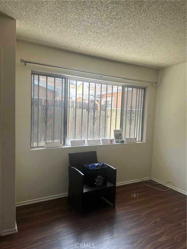 1524 Acacia St Unit 3, Alhambra, CA 91801 - unfurnished room featuring wood finished floors, a textured ceiling, and baseboards