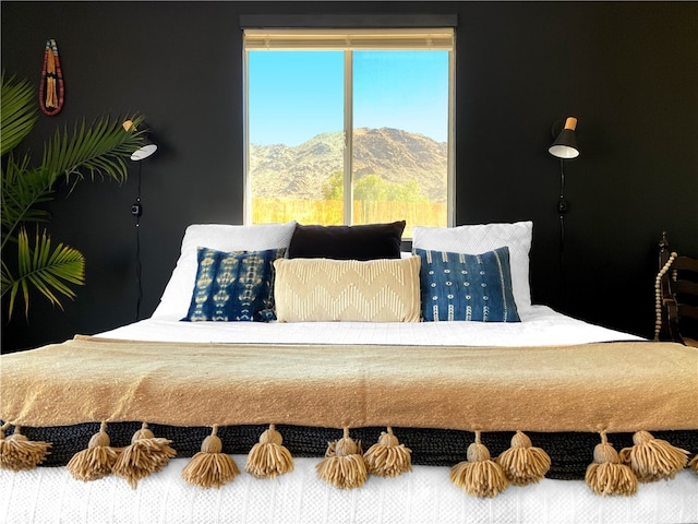 7073 Mission Ave Unit 29, Palms, CA 92277 - bedroom featuring multiple windows and a mountain view