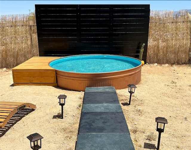 7073 Mission Ave Unit 29, Palms, CA 92277 - view of pool with a hot tub