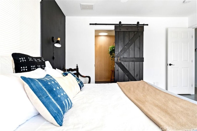 7073 Mission Ave Unit 29, Palms, CA 92277 - bedroom with a barn door