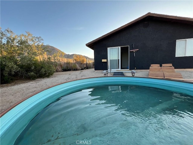 7073 Mission Ave Unit 29, Palms, CA 92277 - view of swimming pool featuring a mountain view