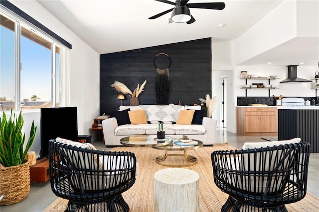 7073 Mission Ave Unit 29, Palms, CA 92277 - living area featuring ceiling fan and vaulted ceiling