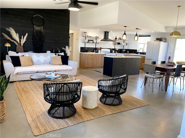 7073 Mission Ave Unit 29, Palms, CA 92277 - living room with concrete floors and a ceiling fan