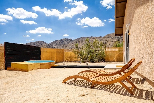 7073 Mission Ave Unit 29, Palms, CA 92277 - fenced backyard with a mountain view