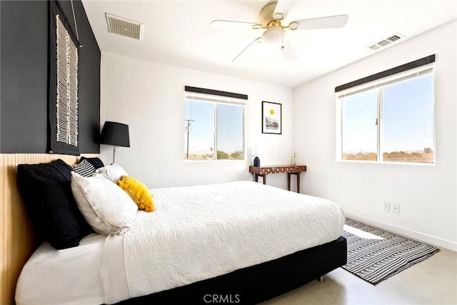 7073 Mission Ave Unit 29, Palms, CA 92277 - bedroom with multiple windows and a ceiling fan