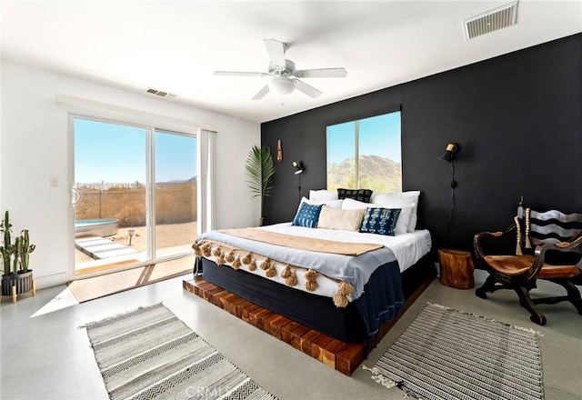 7073 Mission Ave Unit 29, Palms, CA 92277 - bedroom featuring access to outside, concrete flooring, and ceiling fan
