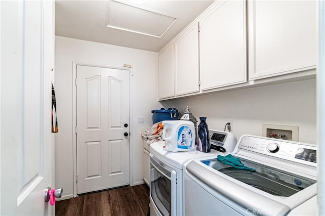 12325 Atoka Ln, Victorville, CA 92392 - laundry room featuring washing machine and dryer, cabinet space, dark wood finished floors, and attic access