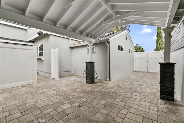 view of patio / terrace with a gate and fence