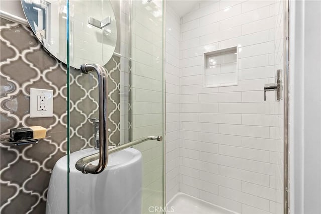bathroom featuring a shower stall