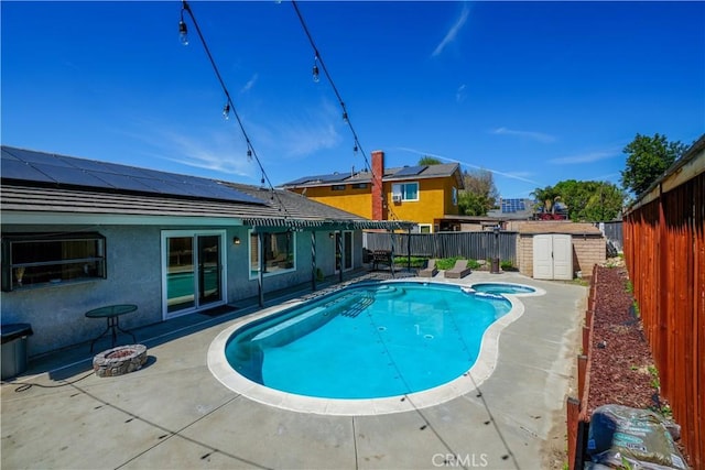 3710 Colonial Cir, Lake Elsinore, CA 92530 - view of pool featuring a patio, a storage unit, a fenced backyard, and an outbuilding