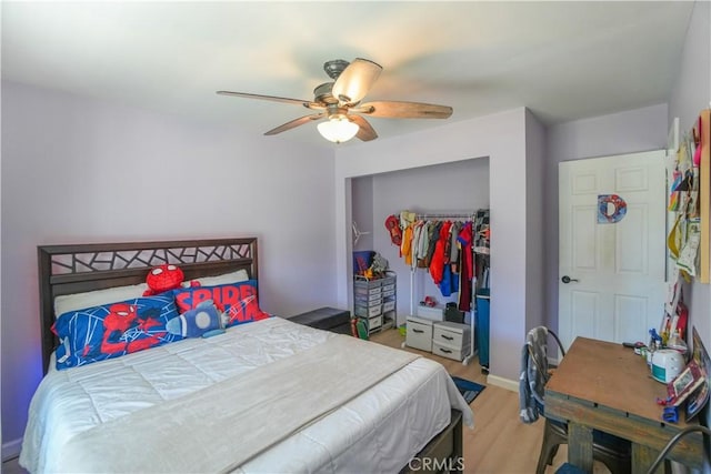 3710 Colonial Cir, Lake Elsinore, CA 92530 - bedroom featuring baseboards, ceiling fan, light wood-style floors, and a closet