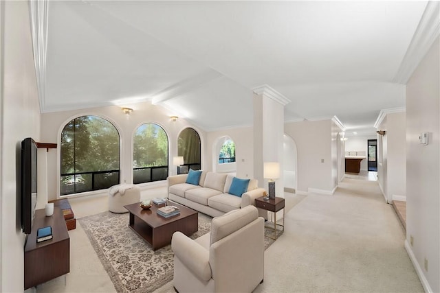 living room featuring baseboards, light colored carpet, ornamental molding, and lofted ceiling